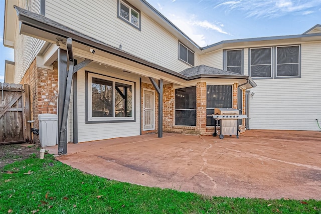 back of house with a patio area