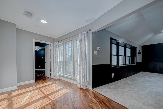 unfurnished bedroom featuring hardwood / wood-style flooring