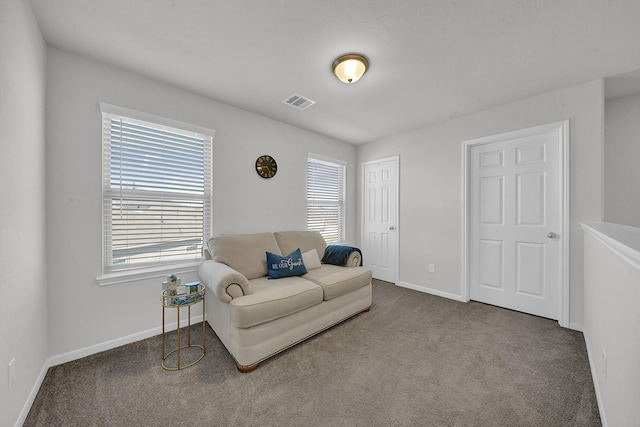 living area with carpet flooring