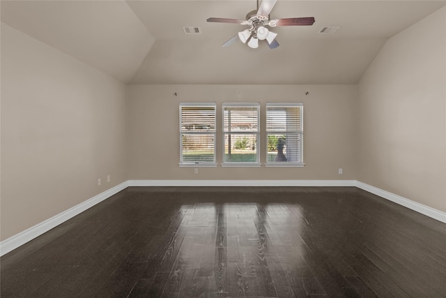 unfurnished room with lofted ceiling, dark wood-type flooring, and ceiling fan