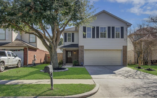 view of front of house with a garage and a front yard