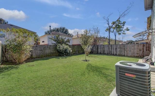 view of yard with central AC