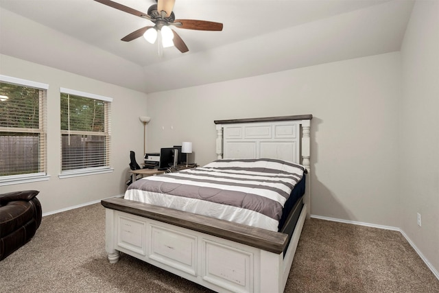 carpeted bedroom featuring vaulted ceiling and ceiling fan