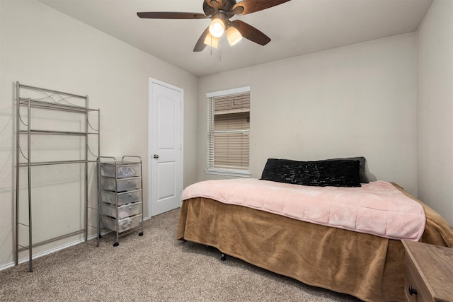 bedroom with ceiling fan and carpet