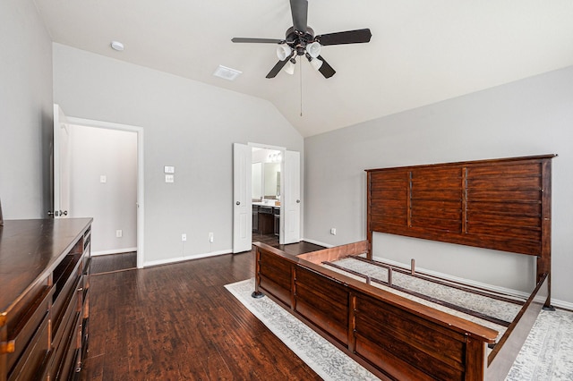 unfurnished bedroom featuring baseboards, visible vents, vaulted ceiling, and dark wood-style flooring