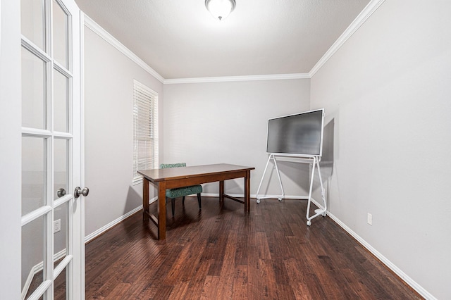 office space featuring dark wood-style floors, baseboards, and crown molding