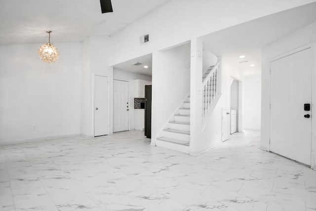 interior space with an inviting chandelier