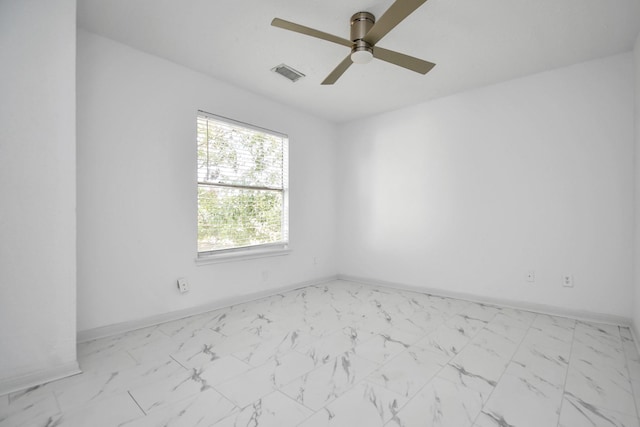 spare room featuring ceiling fan