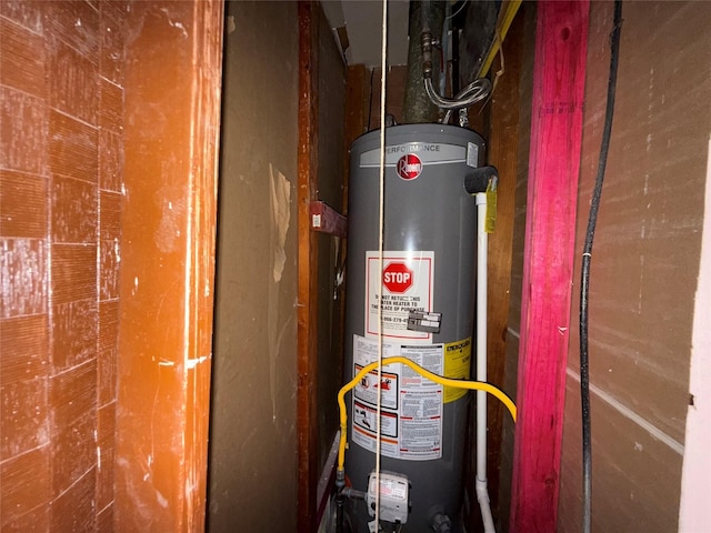 utility room with water heater