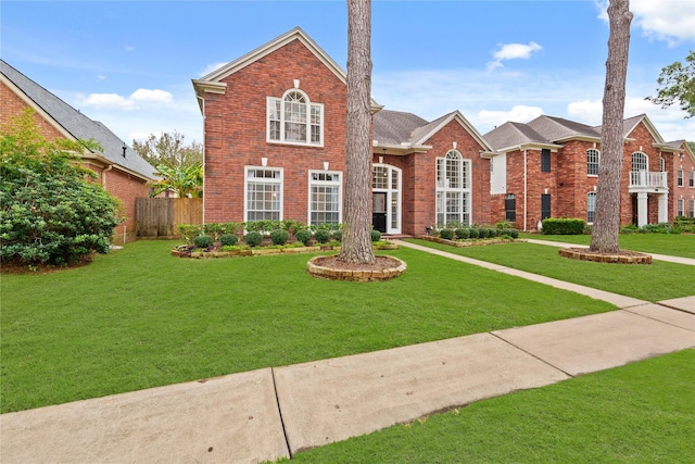 view of property featuring a front yard