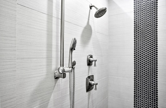 room details with a tile shower