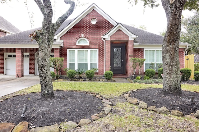 ranch-style home featuring a front yard and a garage