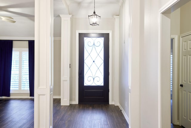 foyer featuring dark wood-type flooring and ceiling fan