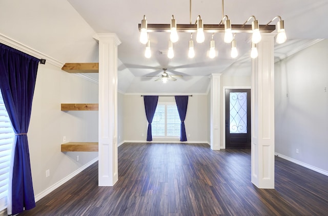 entryway with vaulted ceiling, dark hardwood / wood-style floors, ornate columns, crown molding, and ceiling fan