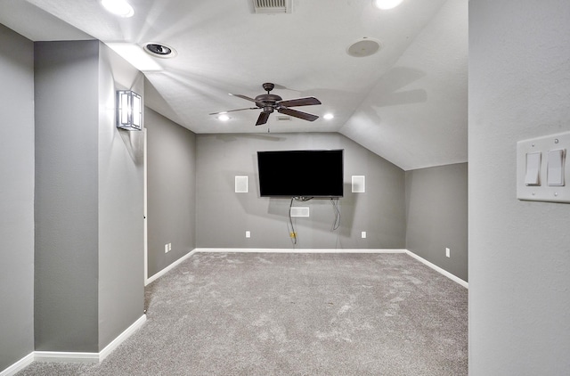 bonus room featuring ceiling fan, vaulted ceiling, and carpet flooring