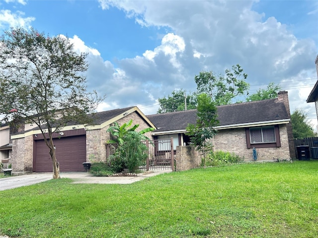 single story home with a front yard and a garage