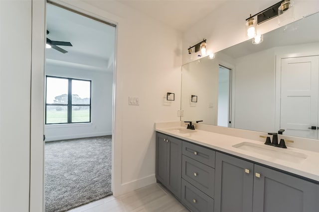 bathroom with vanity and ceiling fan