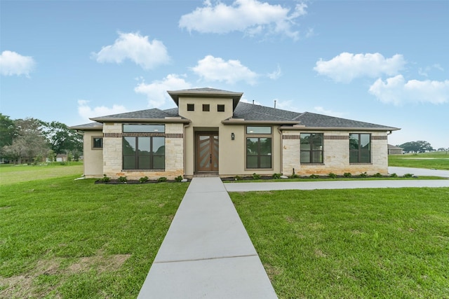 prairie-style house with a front yard