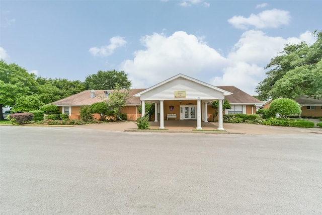 greek revival house with covered porch