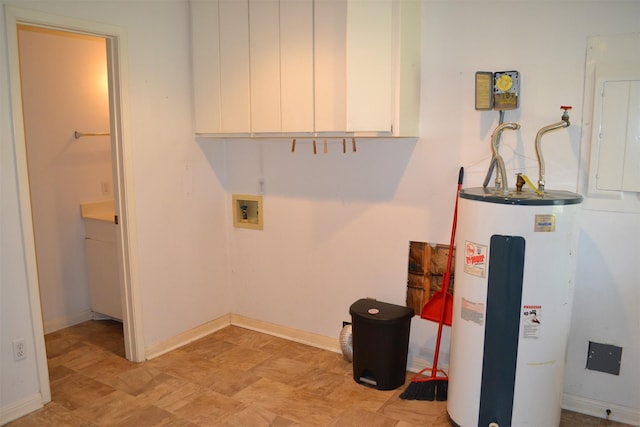 laundry room with cabinets, hookup for a washing machine, electric panel, and electric water heater