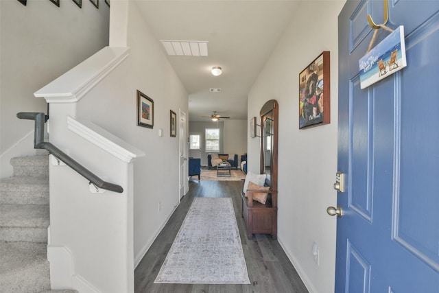 corridor featuring dark hardwood / wood-style flooring