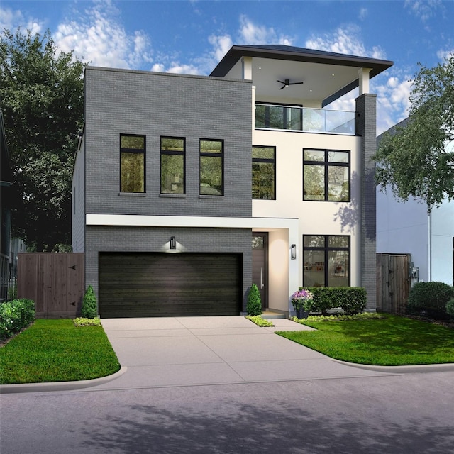 contemporary home featuring a garage and a front lawn