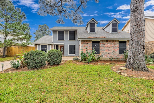 view of front facade with a front yard