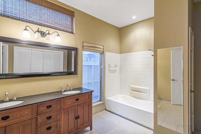 bathroom with separate shower and tub, vanity, and tile patterned floors