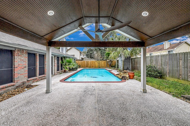 view of swimming pool featuring a patio area