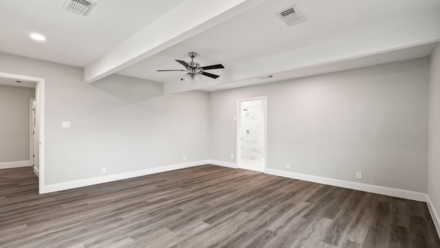 unfurnished room with dark hardwood / wood-style flooring, ceiling fan, and beamed ceiling