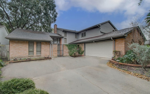 view of front of property featuring a garage, brick siding, fence, concrete driveway, and roof with shingles