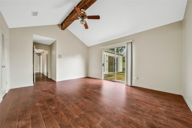 empty room featuring ceiling fan, dark hardwood / wood-style flooring, and vaulted ceiling with beams