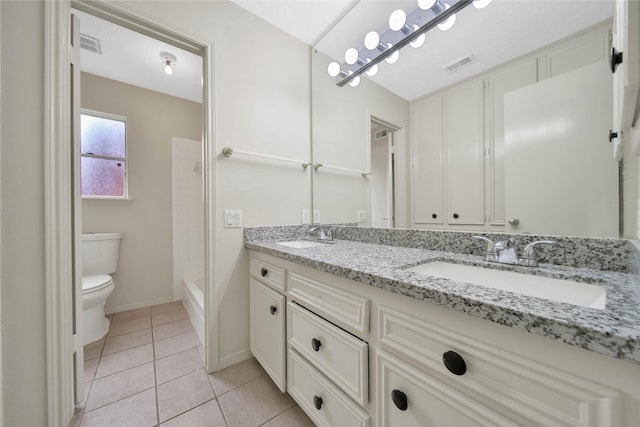 full bathroom featuring toilet, tile patterned floors, washtub / shower combination, and vanity