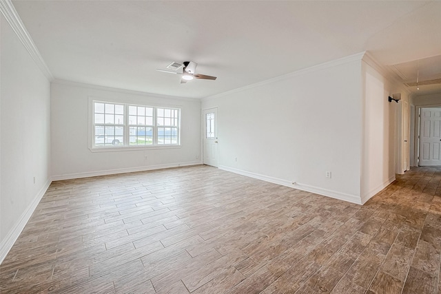 unfurnished room with ceiling fan, light hardwood / wood-style floors, and crown molding