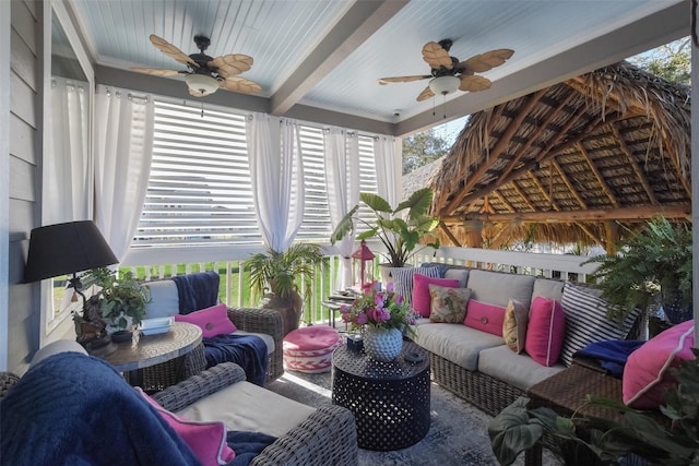 sunroom with wood ceiling and beam ceiling