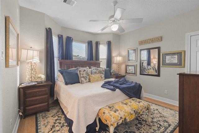 bedroom featuring ceiling fan and hardwood / wood-style floors