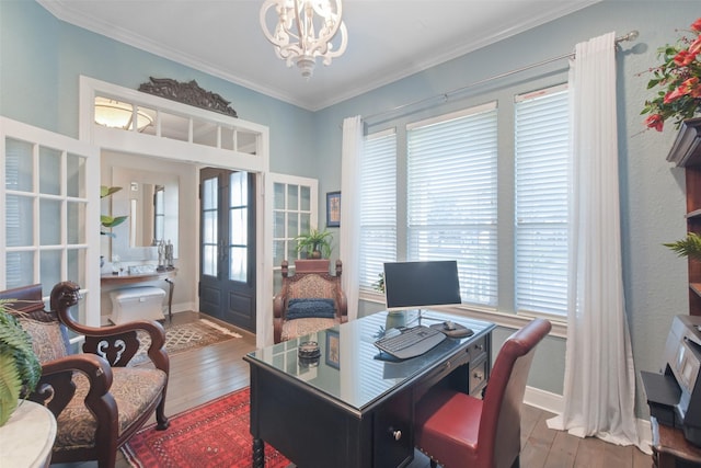 office space with dark hardwood / wood-style floors, crown molding, french doors, and a notable chandelier