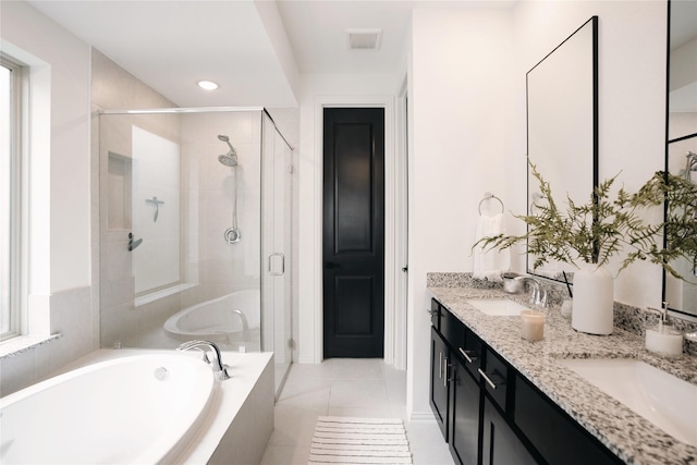 bathroom with vanity, plus walk in shower, and tile patterned floors