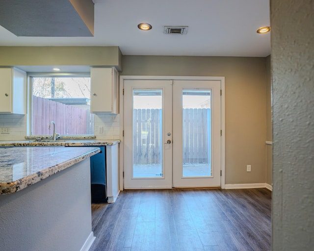 doorway to outside featuring sink, french doors, and dark hardwood / wood-style floors