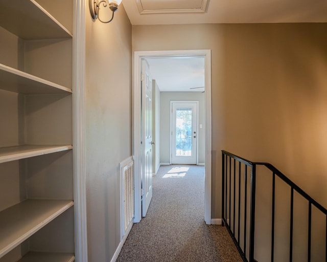 corridor featuring carpet