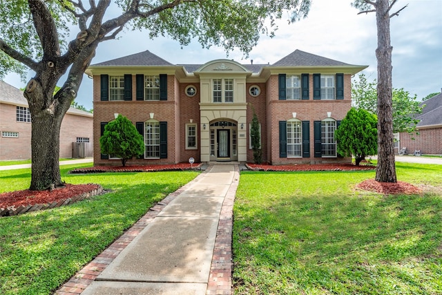 view of front of property with a front lawn