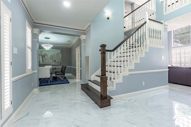 stairs with crown molding