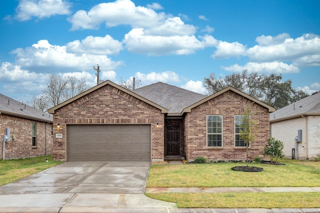 ranch-style house featuring a front yard and a garage