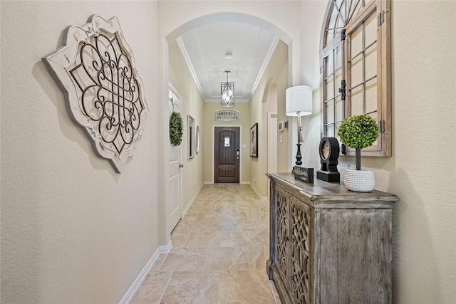 interior space with crown molding