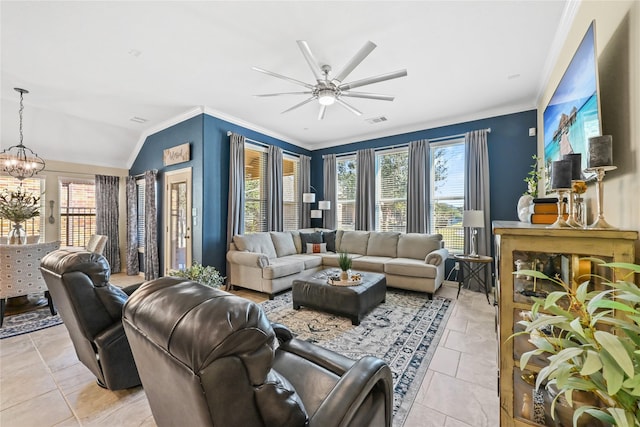 living room with ornamental molding, vaulted ceiling, light tile patterned flooring, and ceiling fan with notable chandelier