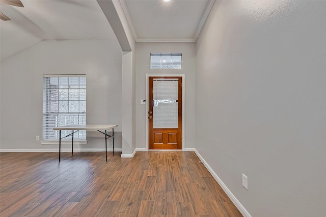 foyer entrance with hardwood / wood-style floors, ceiling fan, and ornamental molding