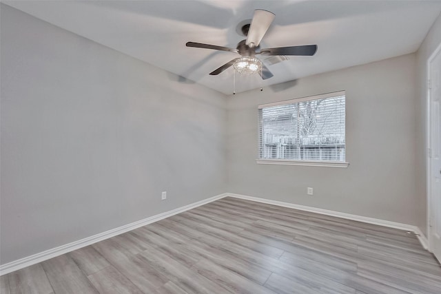 unfurnished room with ceiling fan and light hardwood / wood-style flooring