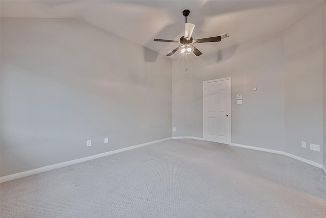 spare room with ceiling fan, carpet, and lofted ceiling