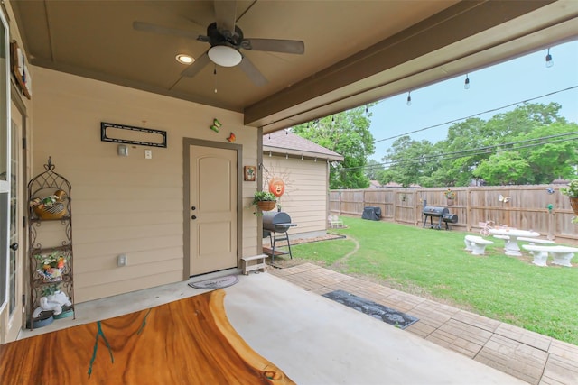 view of patio featuring ceiling fan and area for grilling