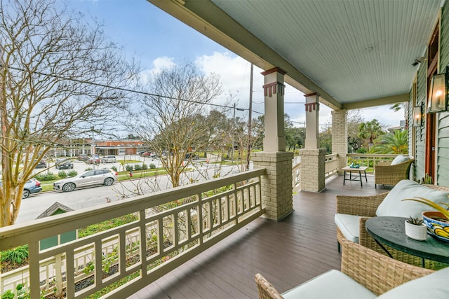 deck featuring covered porch